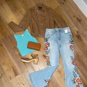 Light denim flare jeans with detailing